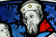 Detail - Corporal Acts of Mercy painted stained glass panel